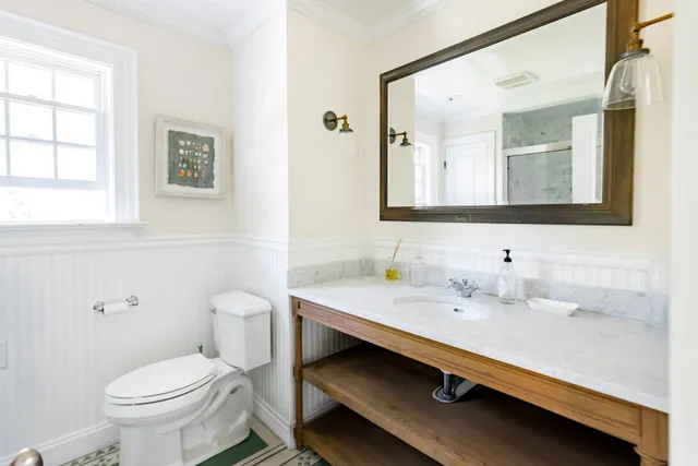 a bathroom with a sink and a toilet