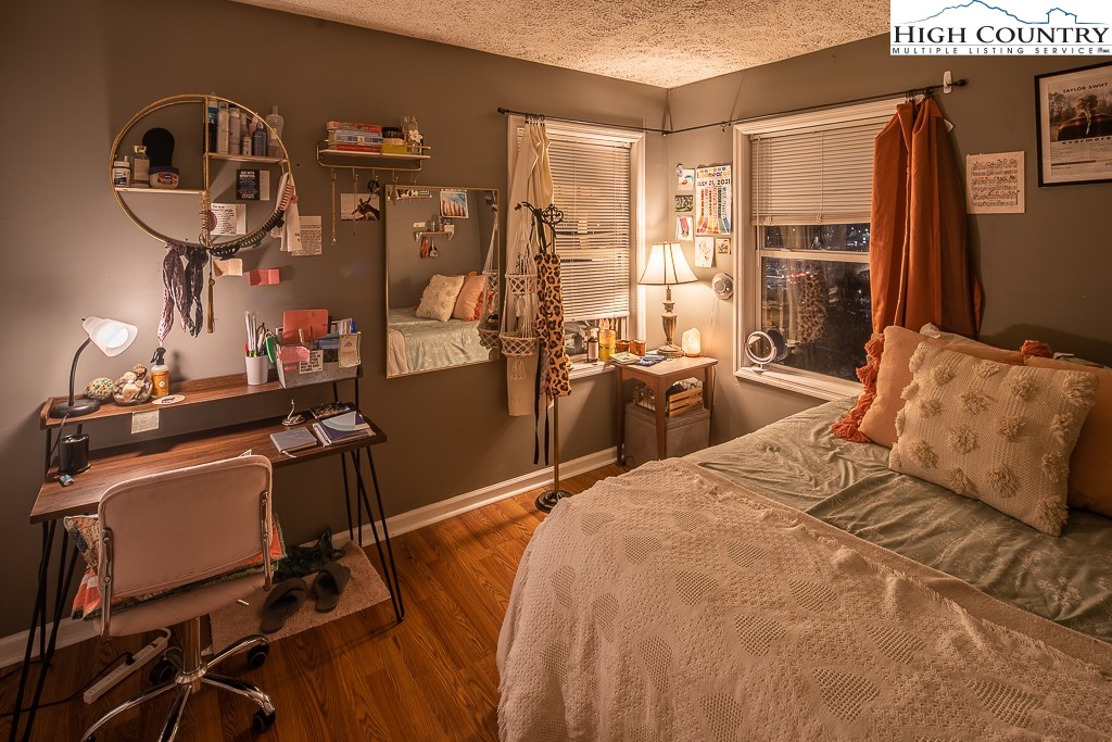 800 Meadowview Drive, Unit 6 Boone, NC 28607 - Photo 12 of 19 a bedroom with bed and window
