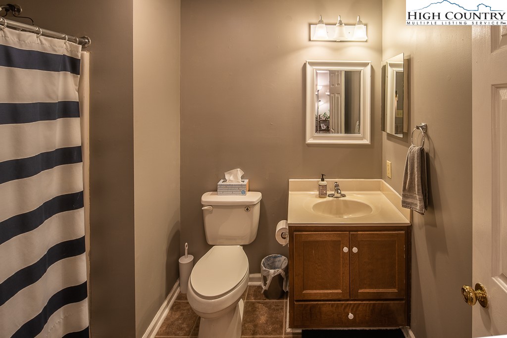800 Meadowview Drive, Unit 6 Boone, NC 28607 - Photo 17 of 19 a bathroom with a sink and a toilet