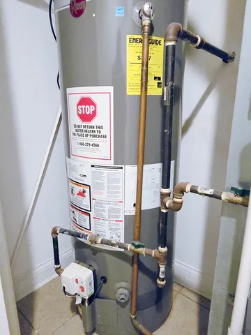 a bathroom with a toilet and a sink