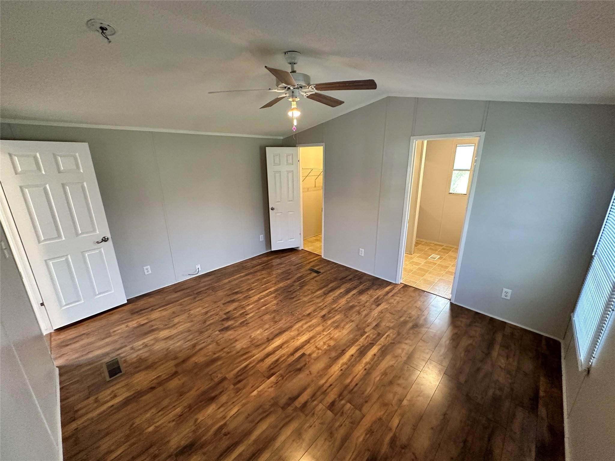 30841 Clyde Lane Hockley, TX 77447 - Photo 11 of 26 a view of empty room with wooden floor and fan