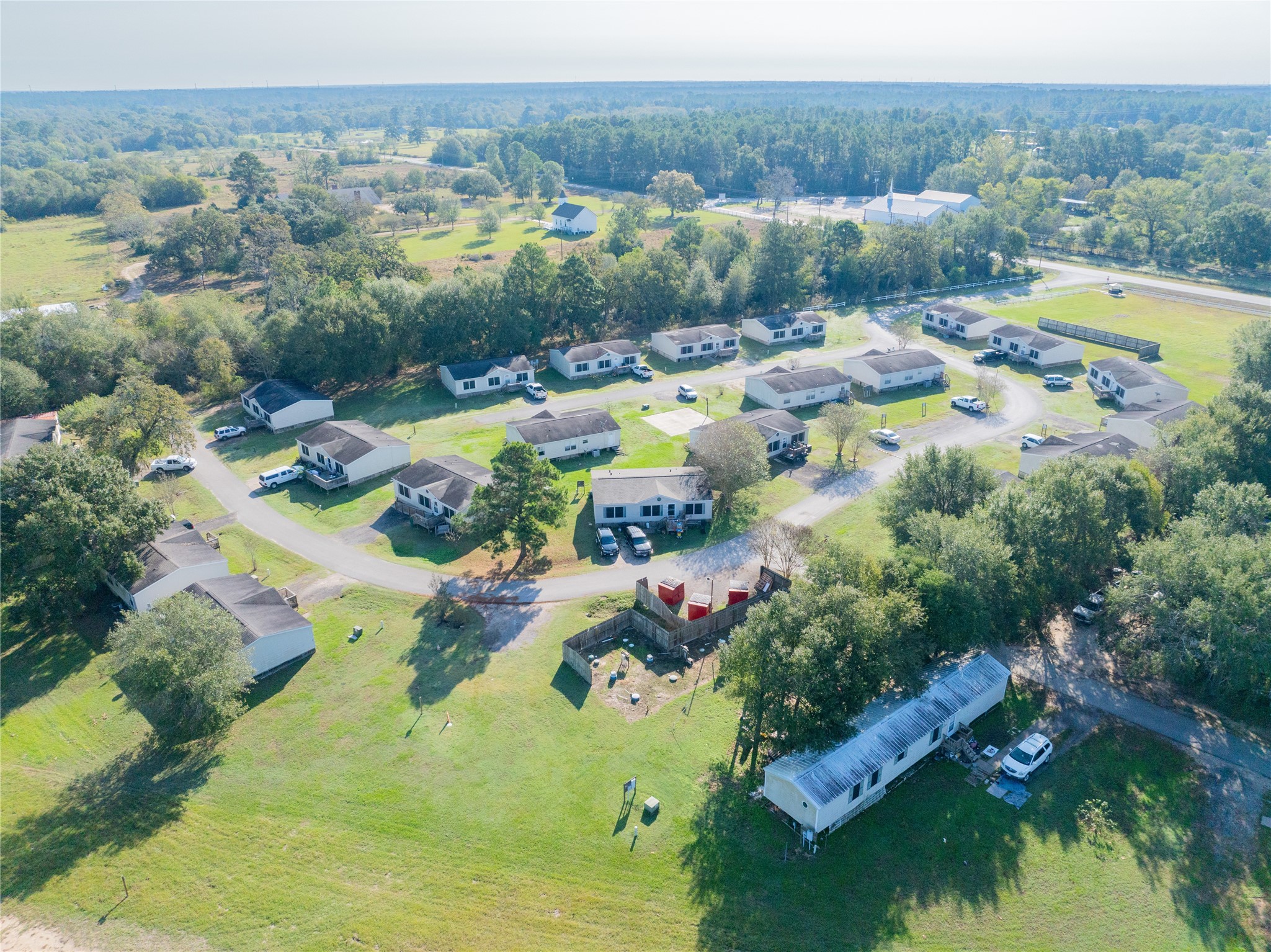 30841 Clyde Lane Hockley, TX 77447 - Photo 26 of 26 an aerial view of residential houses with outdoor space and swimming pool