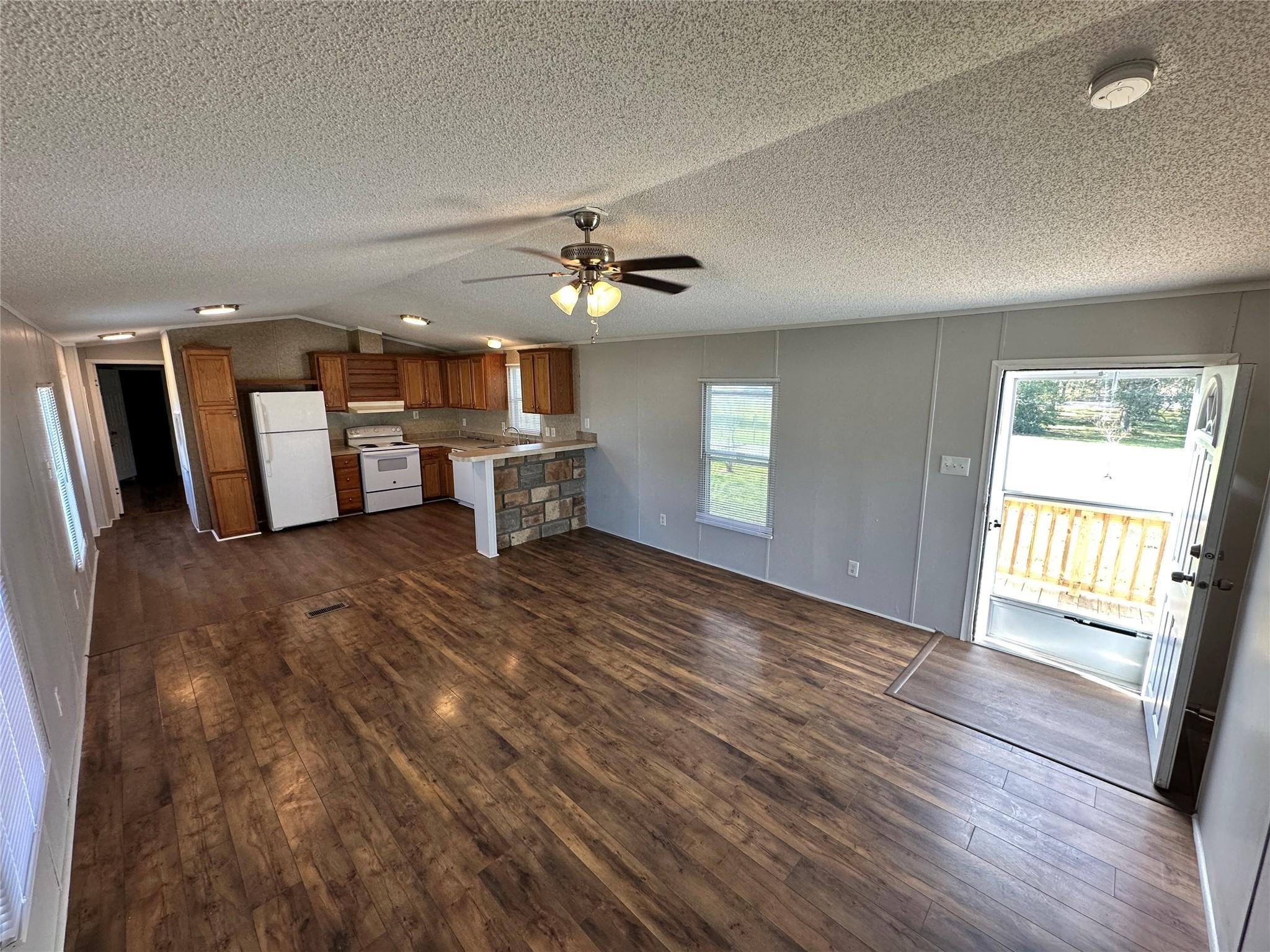 30841 Clyde Lane Hockley, TX 77447 - Photo 5 of 26 a view of a livingroom with furniture window and wooden floor