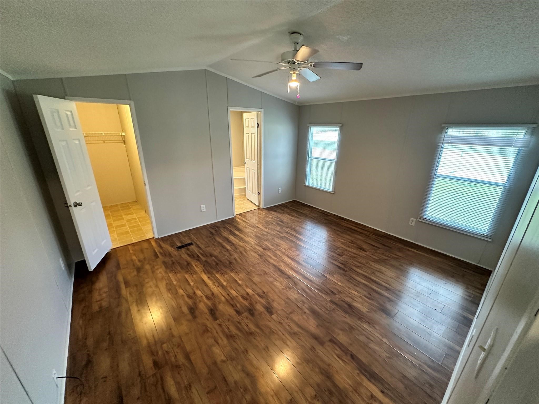 30841 Clyde Lane Hockley, TX 77447 - Photo 10 of 26 wooden floor in an empty room with a window