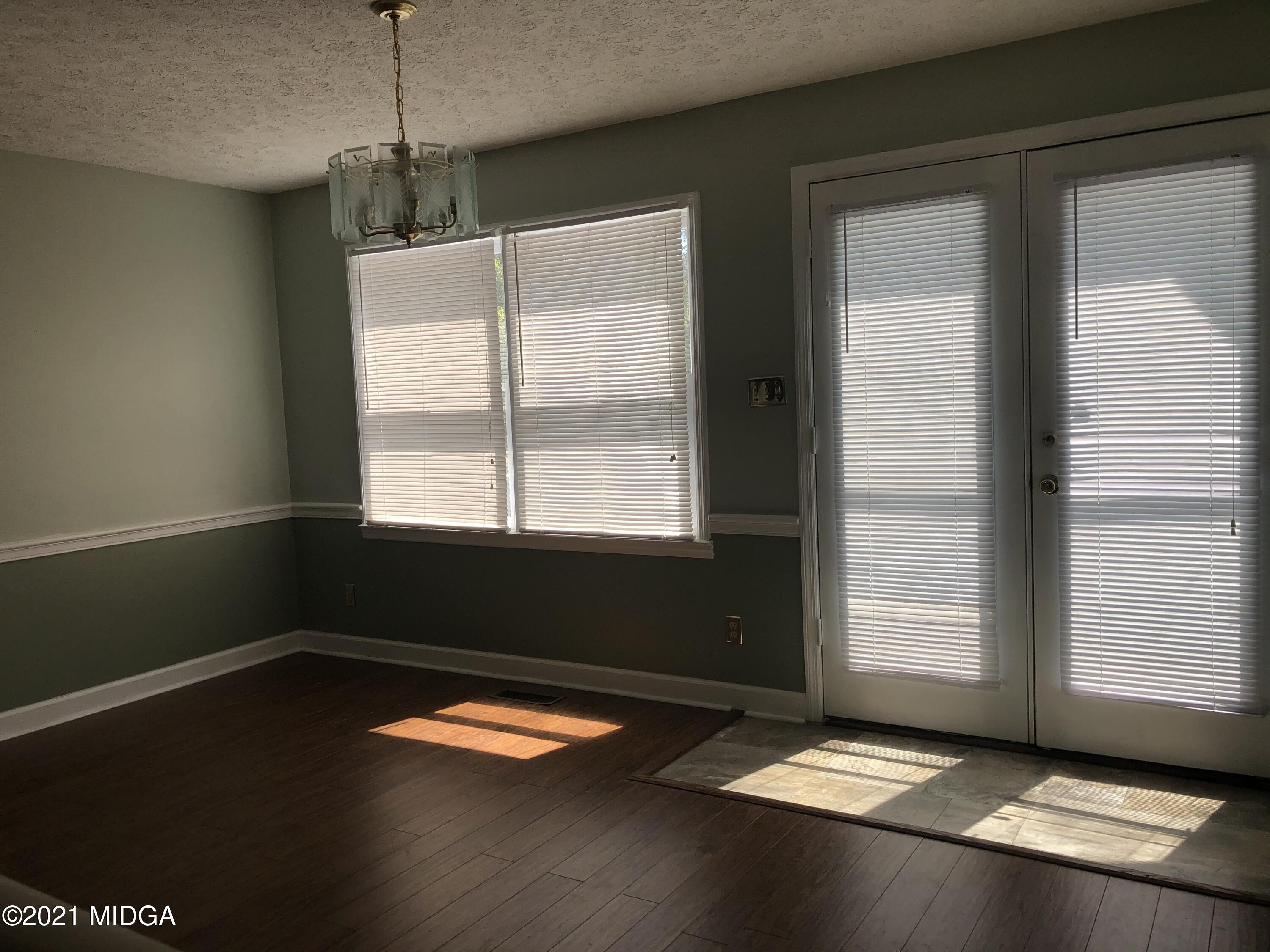 4980 Dixon Road Lizella, GA 31052 - Photo 6 of 10 a view of empty room with windows