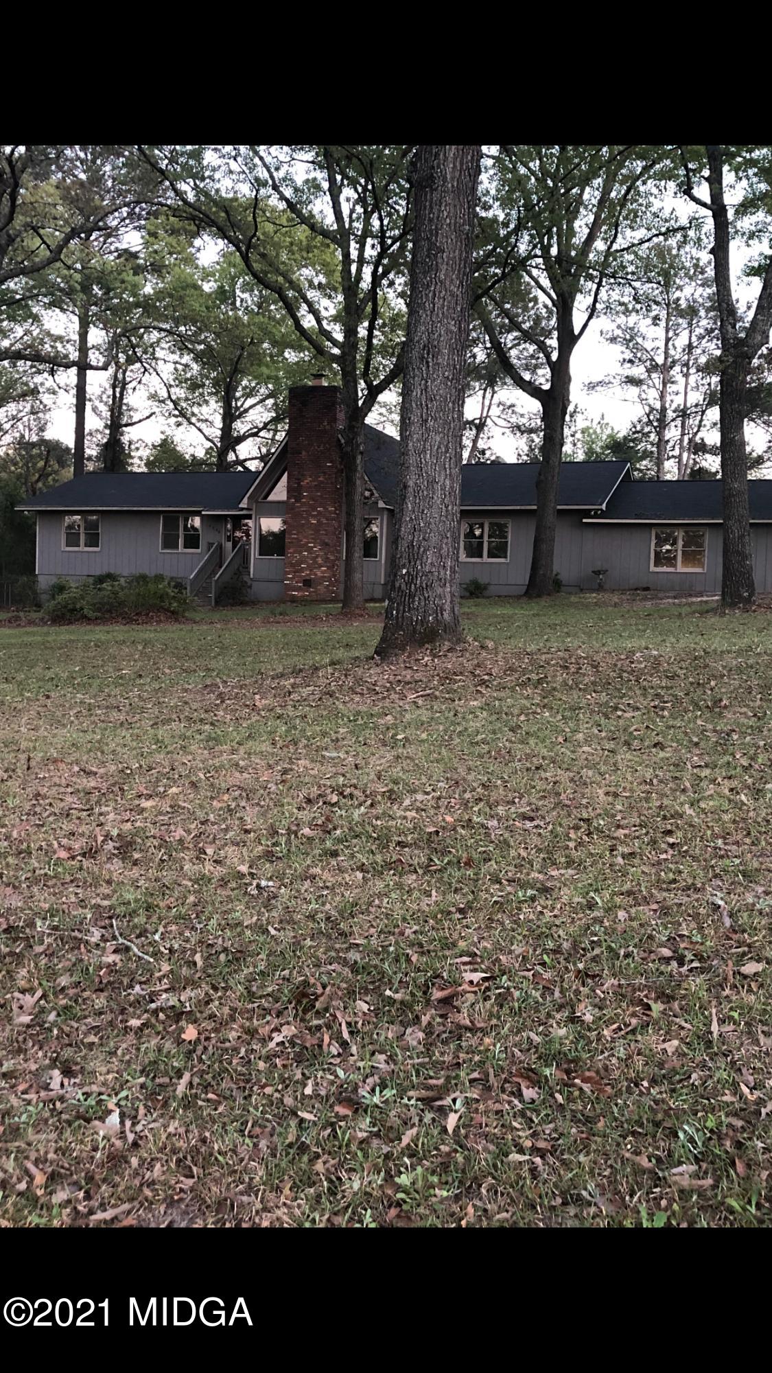 4980 Dixon Road Lizella, GA 31052 - Photo 10 of 10 a view of house with a backyard space