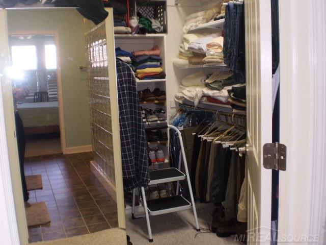 1923 Dunham Drive, Unit 90 Rochester, MI 48306 - Photo 15 of 27 Master Closet 1