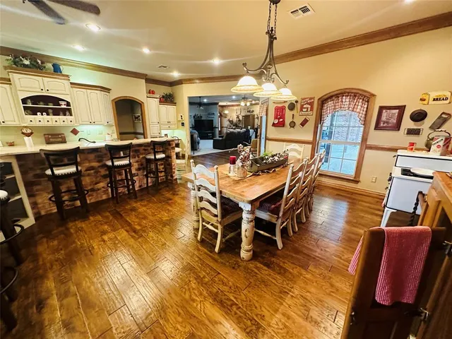 a view of a dining room with furniture