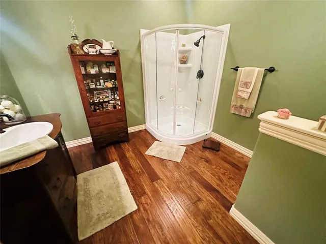 a bathroom with a sink and mirror