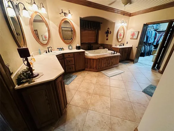 a view of a storage & utility room with two washing machine