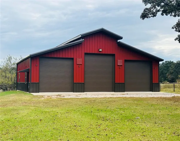 a view of a tree with a yard
