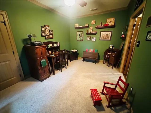 a room with furniture and musical instruments