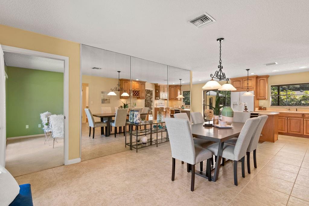 124 Valencia Loop Altamonte Springs, FL 32714 - Photo 4 of 46 View of dining and kitchen combo from front entrance