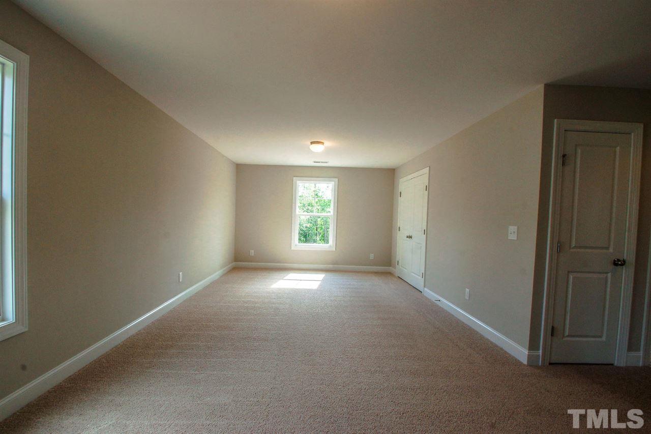 1124 Silver Farm Road Raleigh, NC 27603 - Photo 17 of 25 a view of empty room with window