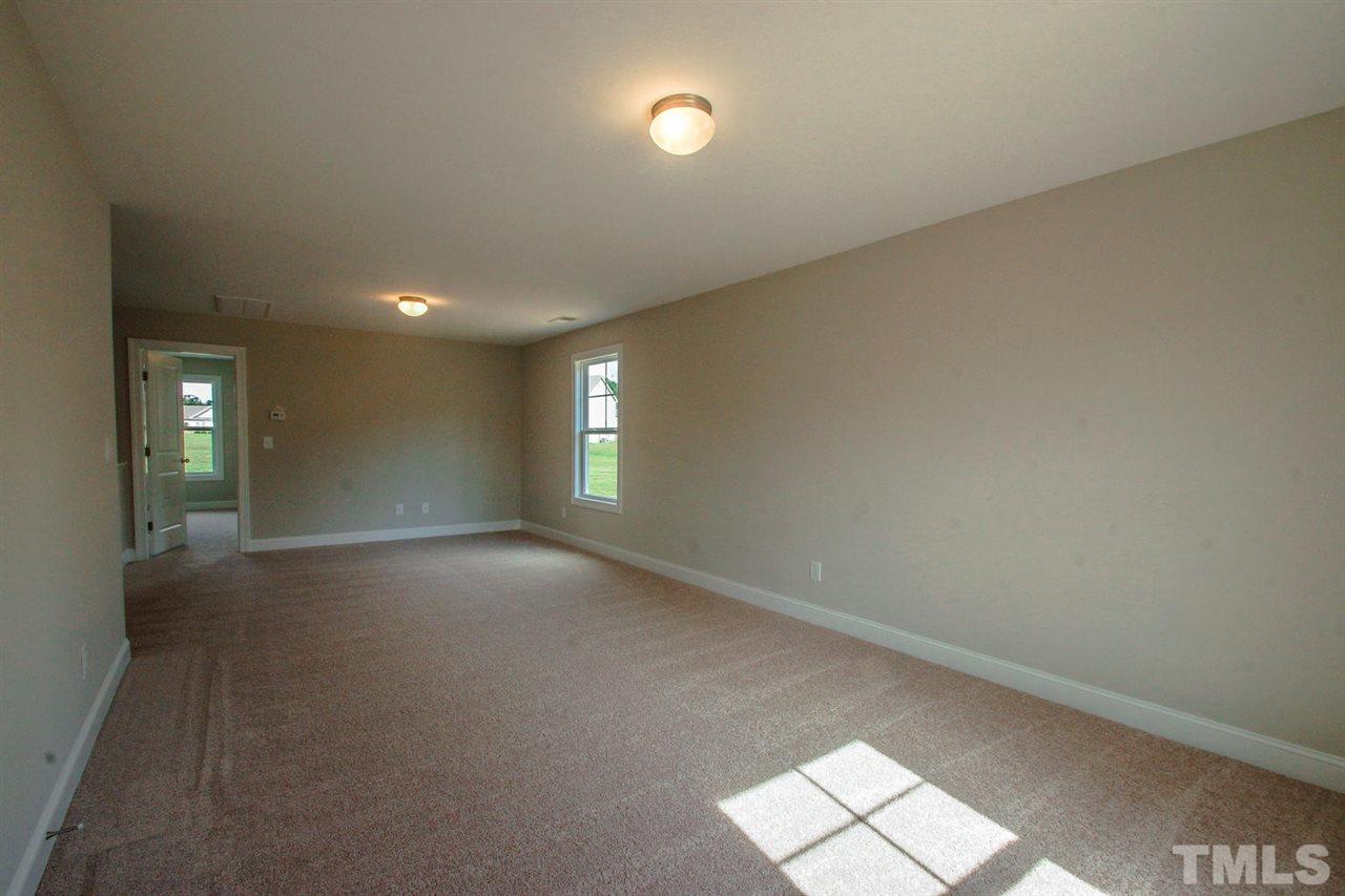 1124 Silver Farm Road Raleigh, NC 27603 - Photo 18 of 25 a view of empty room with window