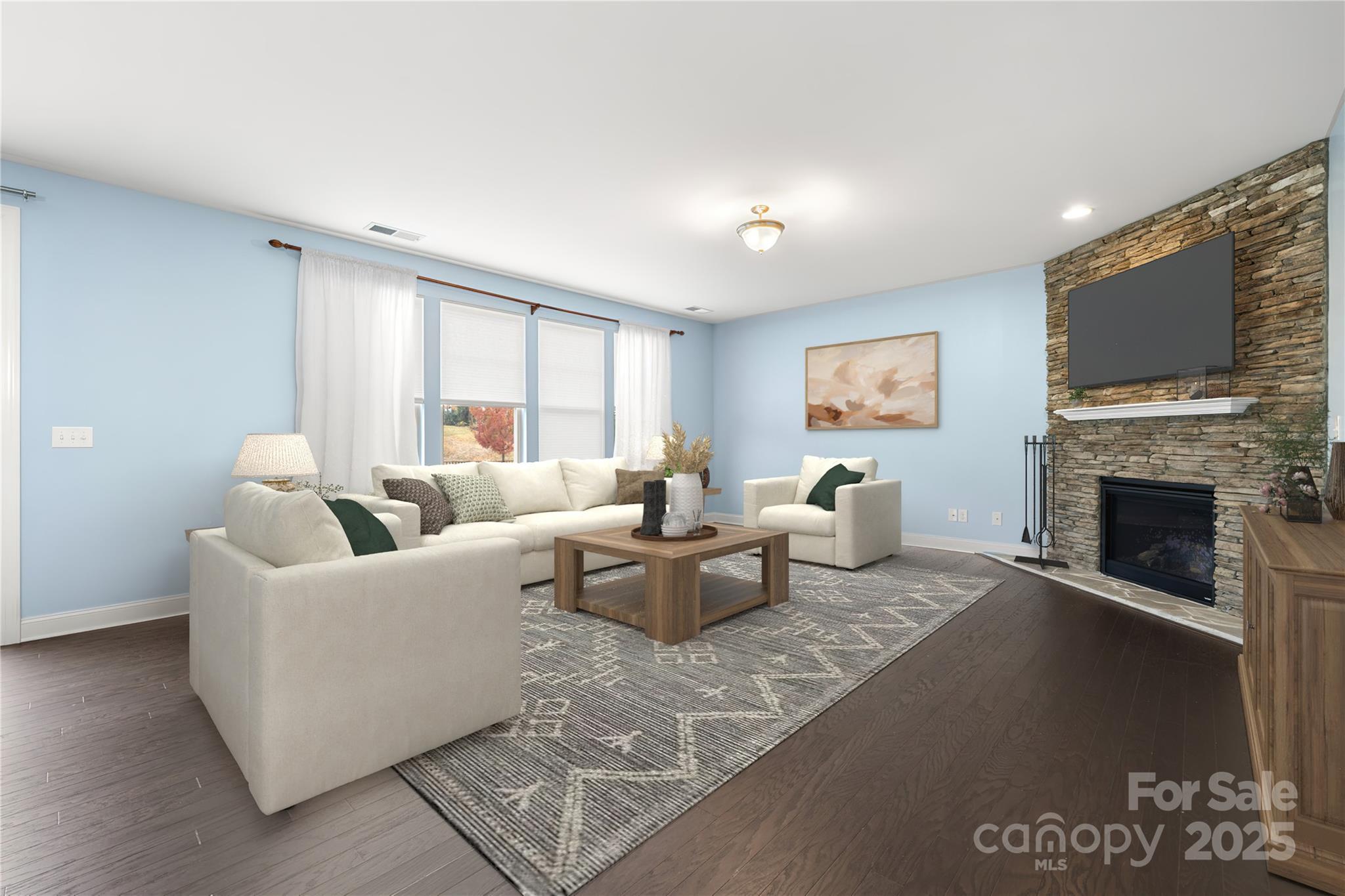 206 Houston Blair Road Matthews, NC 28104 - Photo 11 of 44 a living room with furniture and a fireplace