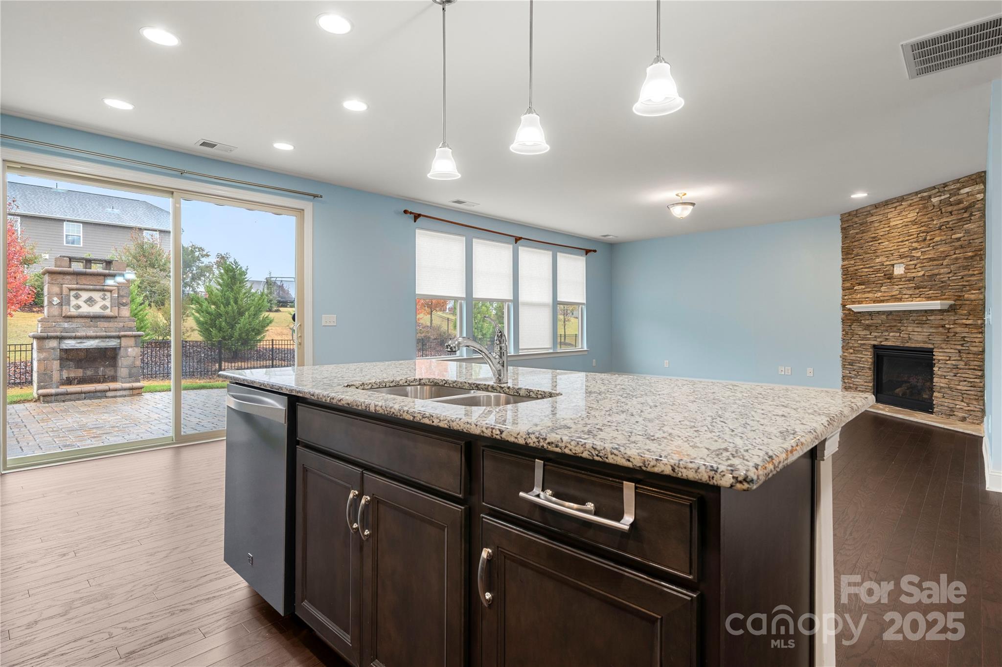 206 Houston Blair Road Matthews, NC 28104 - Photo 15 of 44 a kitchen with kitchen island granite countertop a stove and a sink