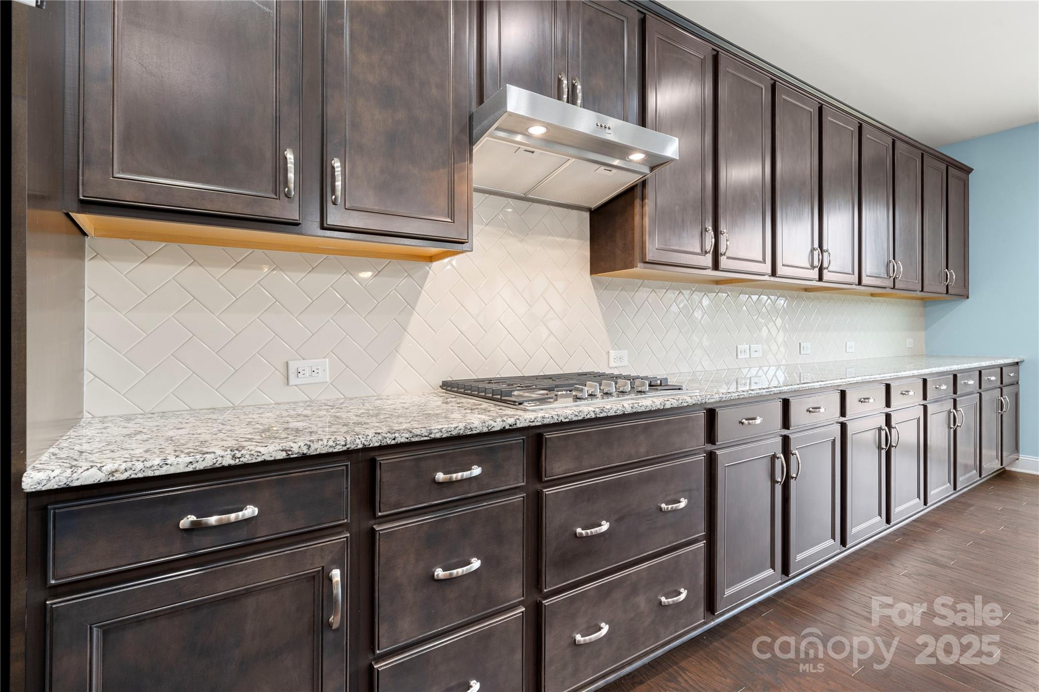 206 Houston Blair Road Matthews, NC 28104 - Photo 20 of 44 a kitchen with granite countertop stainless steel appliances a cabinets and a counter top space