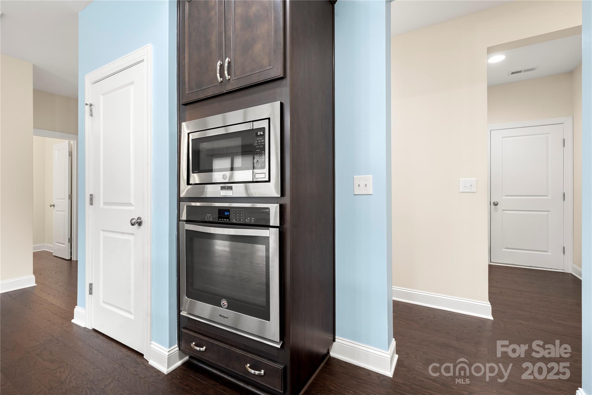 206 Houston Blair Road Matthews, NC 28104 - Photo 21 of 44 a kitchen with a refrigerator and a stove
