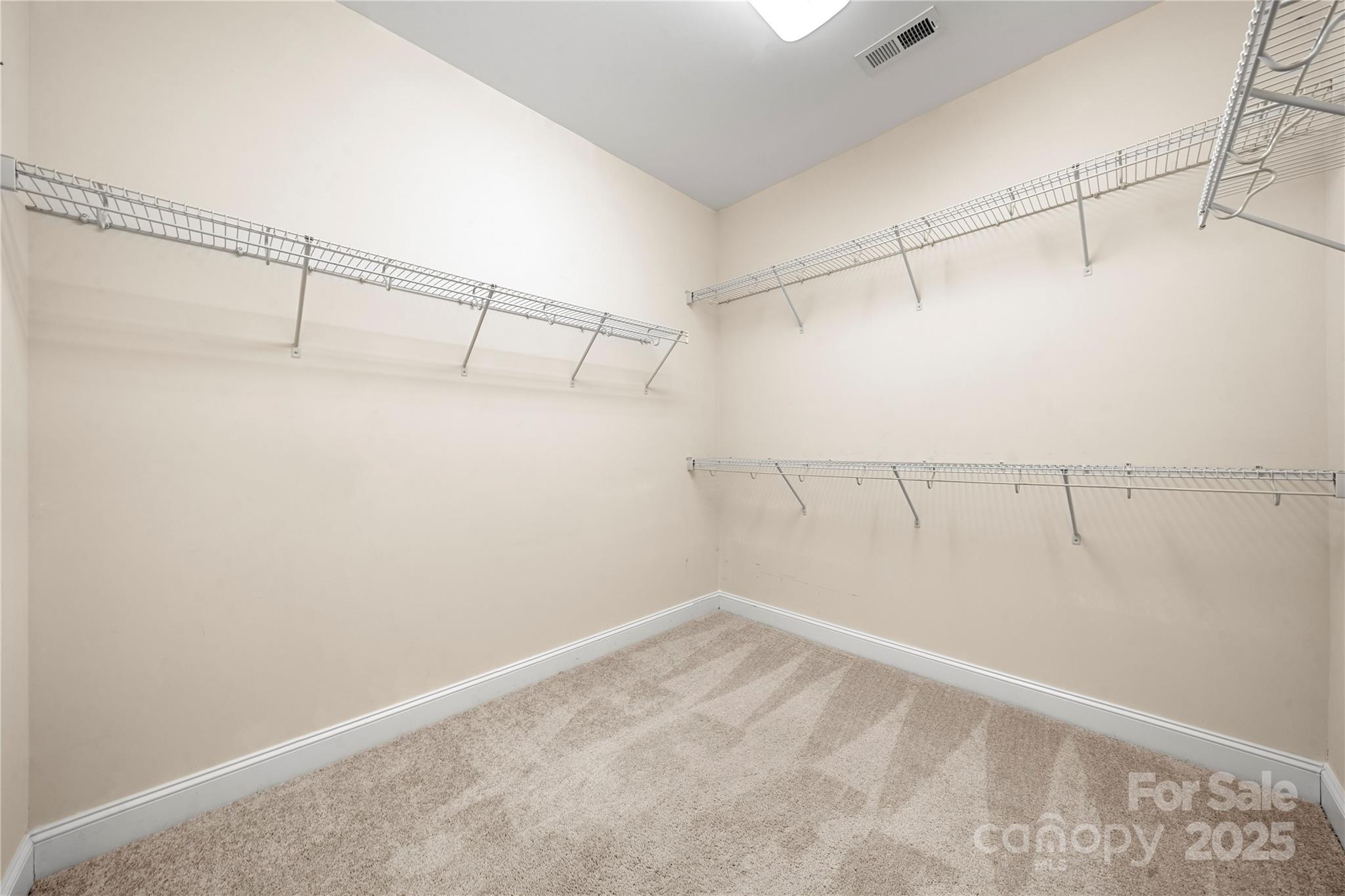 206 Houston Blair Road Matthews, NC 28104 - Photo 28 of 44 a view of a room with racks on the wall