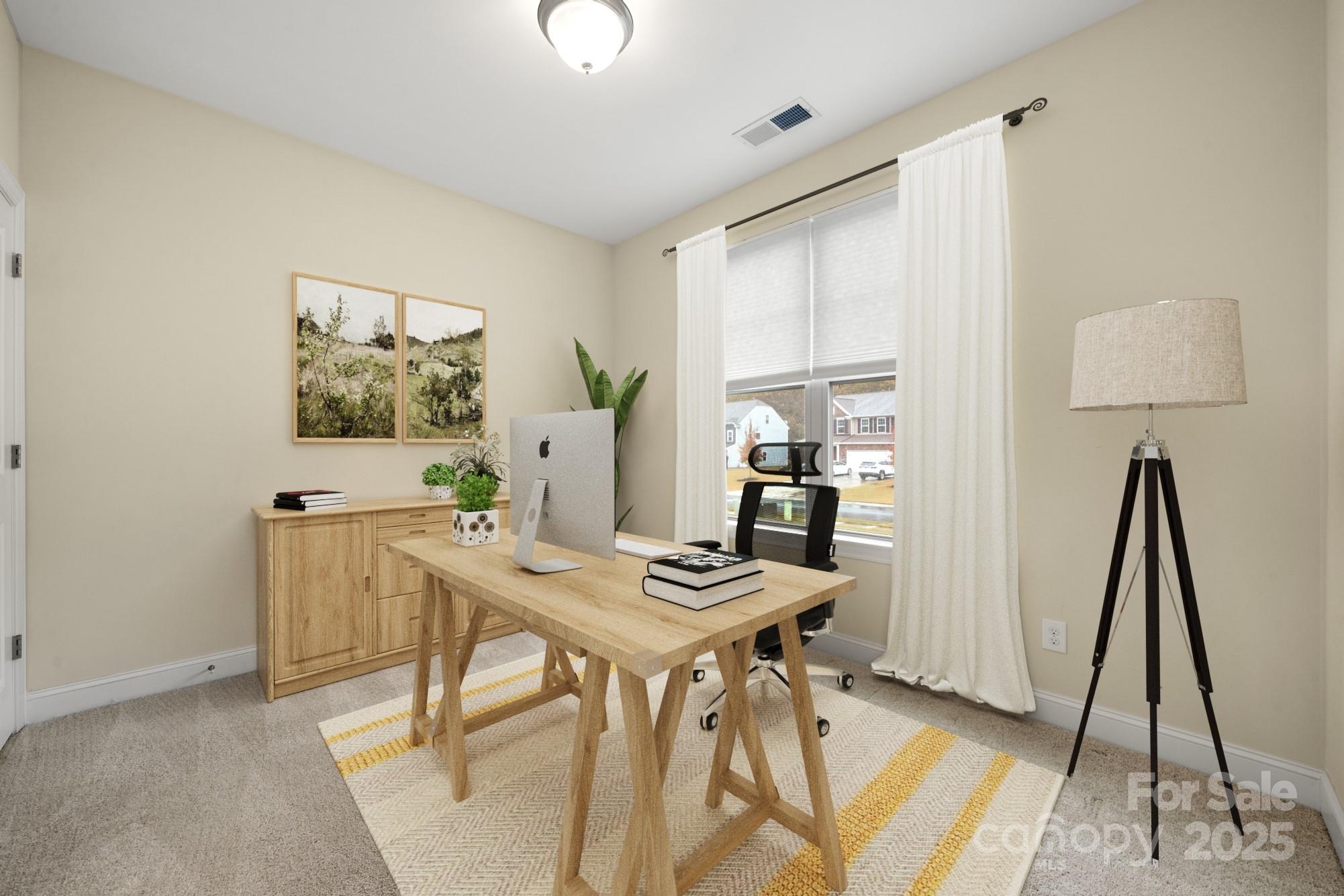 206 Houston Blair Road Matthews, NC 28104 - Photo 3 of 44 a view of a workspace with furniture and a window