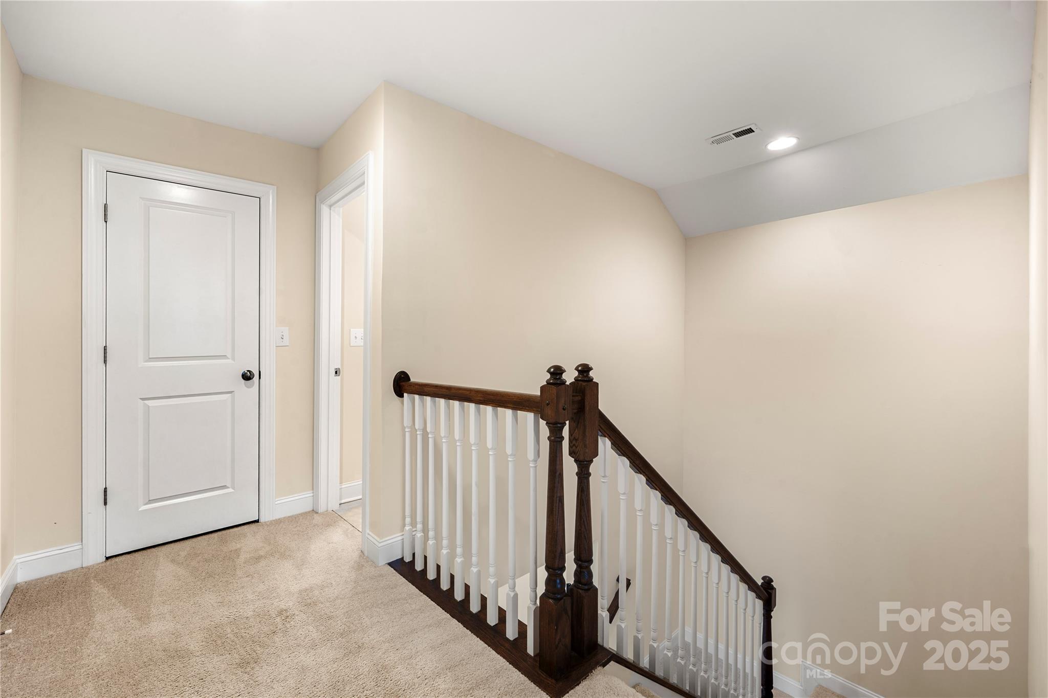206 Houston Blair Road Matthews, NC 28104 - Photo 32 of 44 a view of a hallway with a hallway