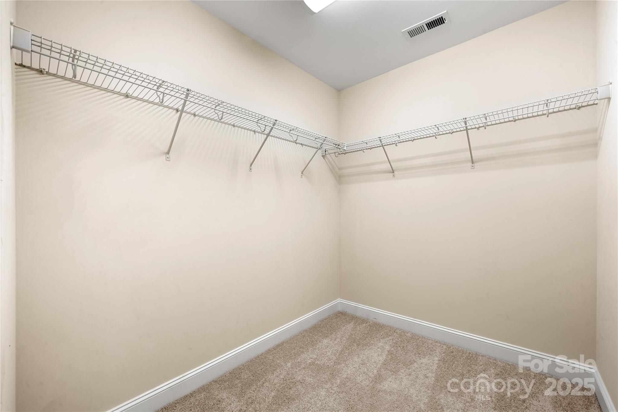 206 Houston Blair Road Matthews, NC 28104 - Photo 36 of 44 a view of a room with racks on the wall