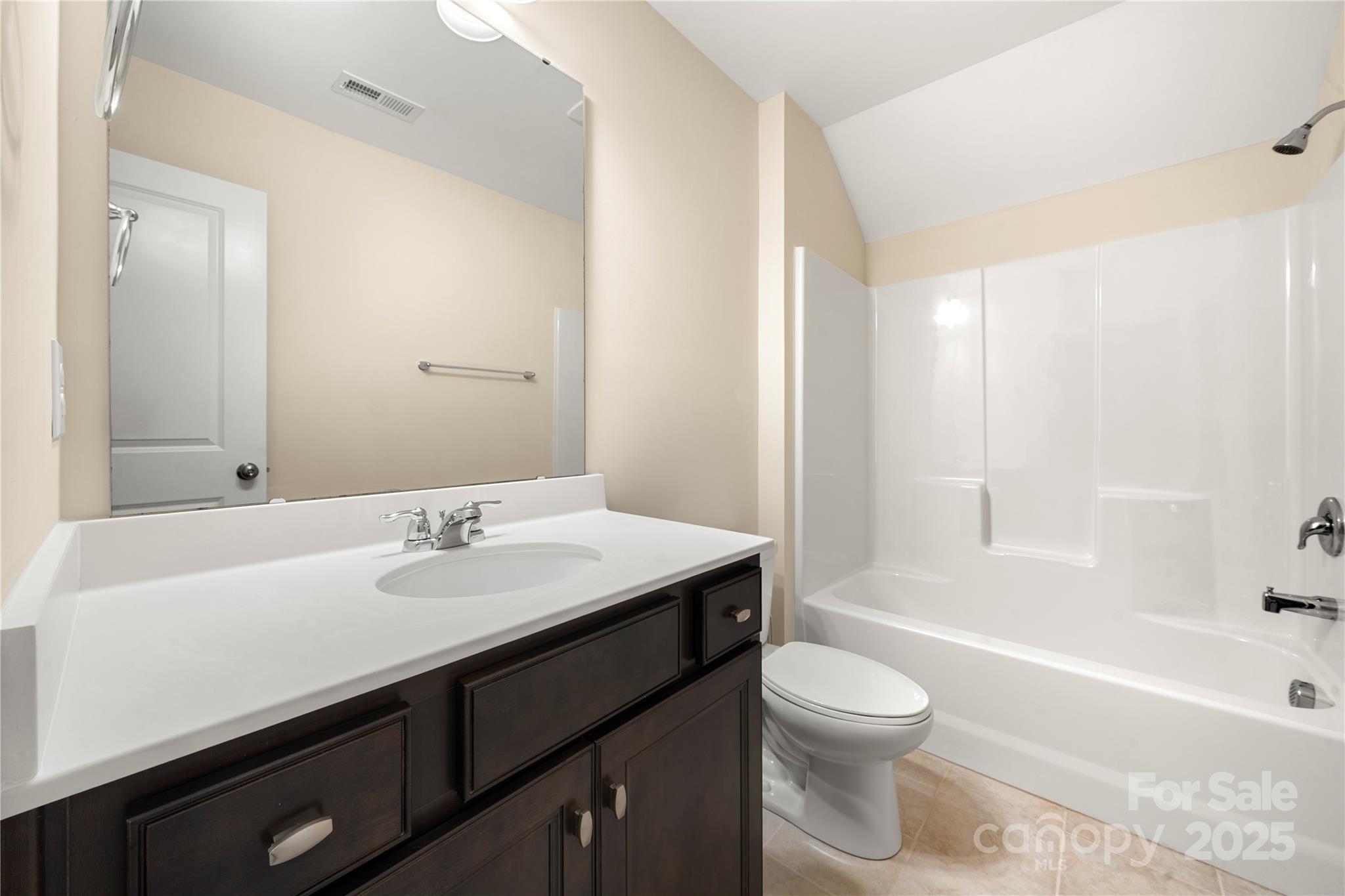 206 Houston Blair Road Matthews, NC 28104 - Photo 37 of 44 a bathroom with a sink a toilet and shower