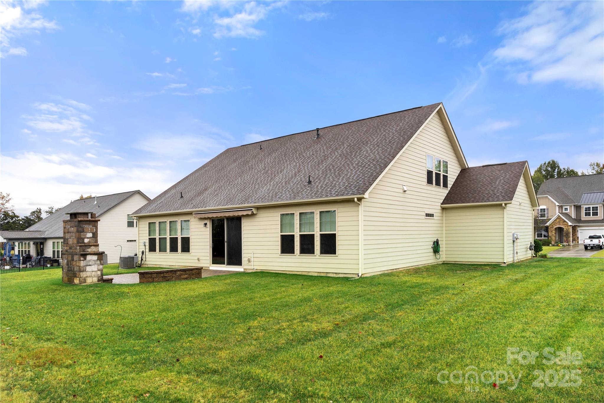 206 Houston Blair Road Matthews, NC 28104 - Photo 41 of 44 a front view of a house with a garden and yard