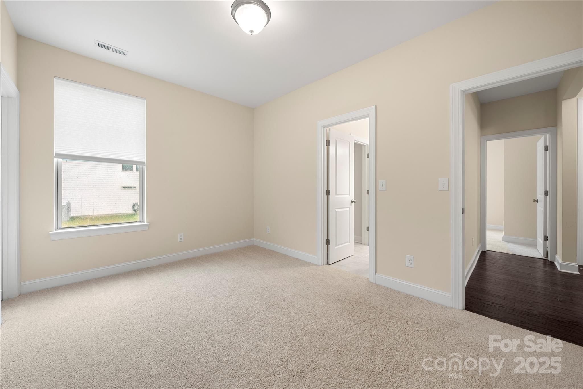 206 Houston Blair Road Matthews, NC 28104 - Photo 6 of 44 an empty room with windows