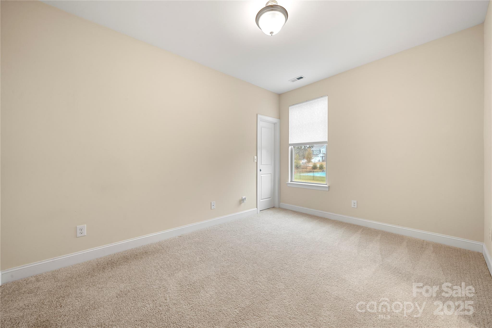 206 Houston Blair Road Matthews, NC 28104 - Photo 7 of 44 an empty room with windows