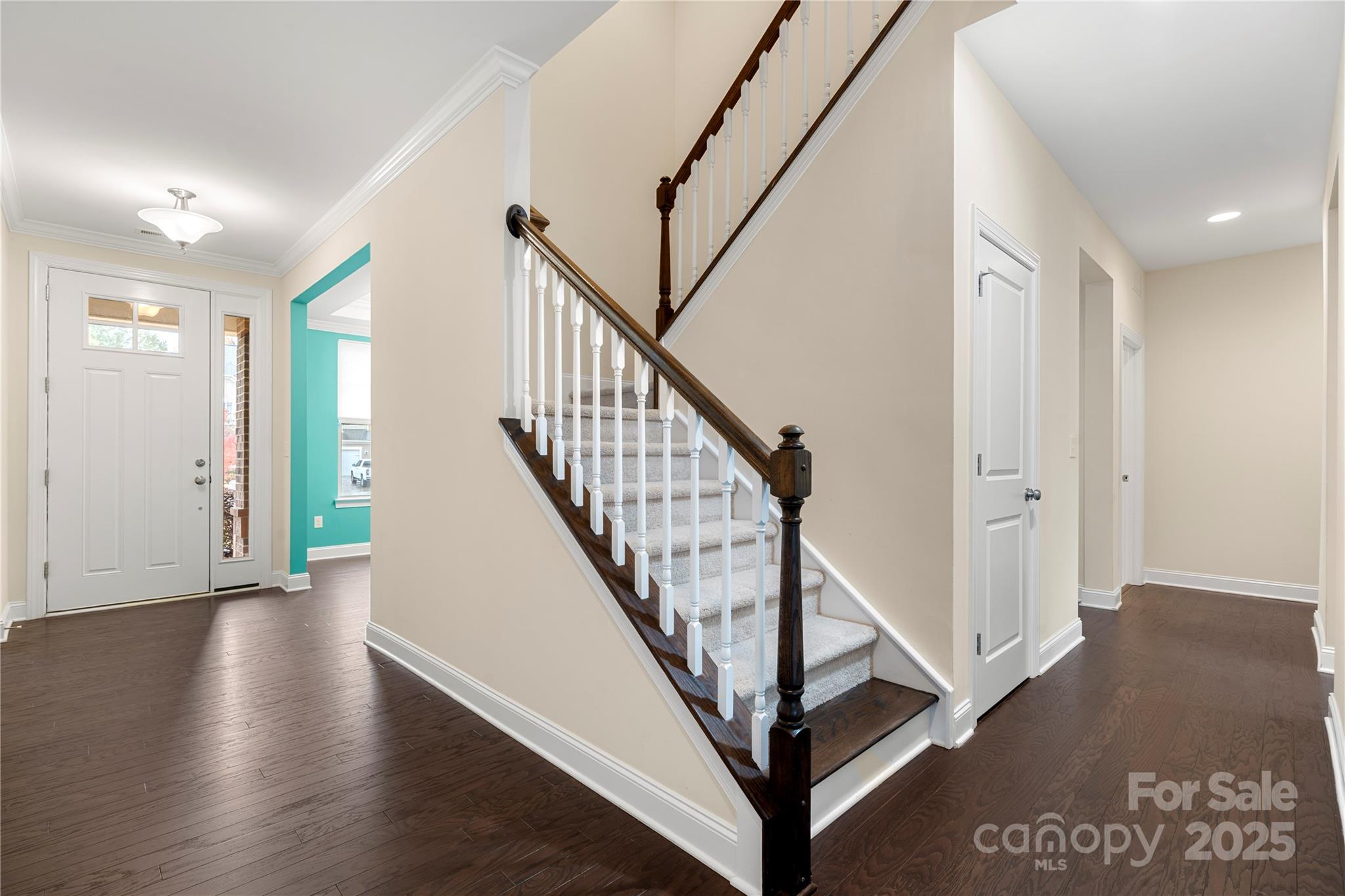 206 Houston Blair Road Matthews, NC 28104 - Photo 10 of 44 a view of an entryway with wooden floor