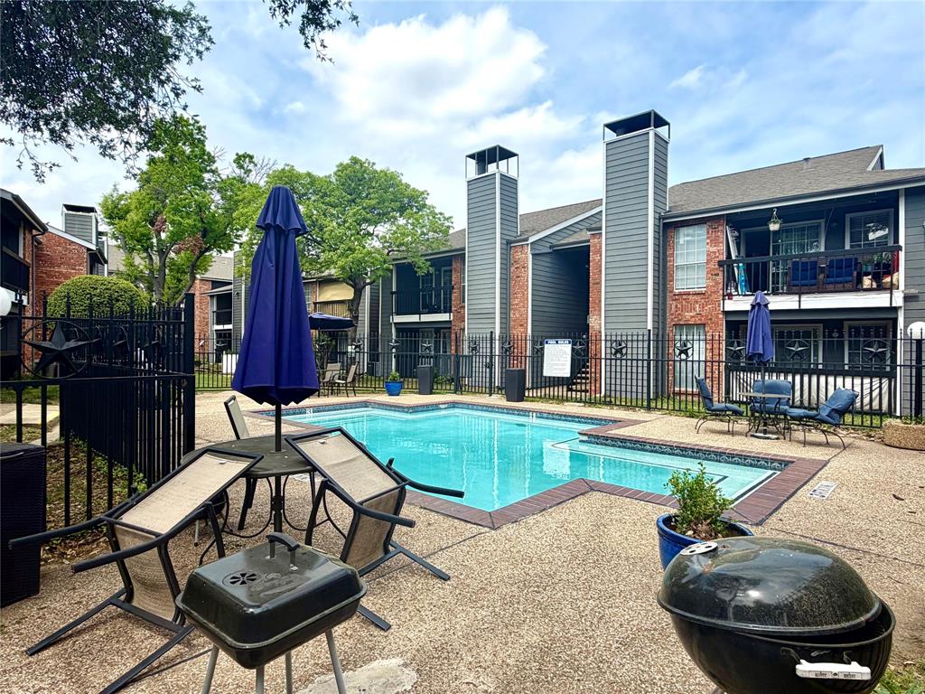 18333 Roehampton Drive, Unit 624 Dallas, TX 75252 - Photo 39 of 39 a view of a house with swimming pool and sitting area