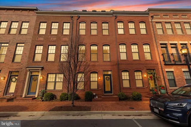 a view of a yard with swimming pool and sitting area