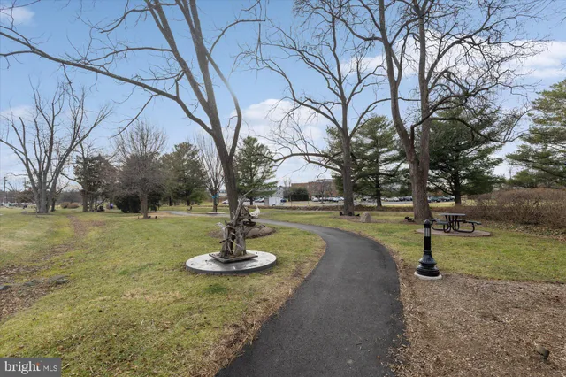 a view of a city street with a building