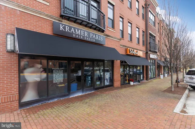 a city street lined with buildings and cars