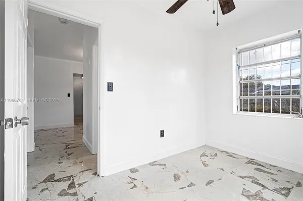 a view of a room with a bedroom