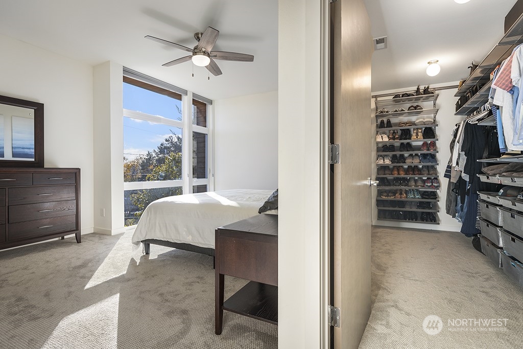 1406 South Bennett Street Seattle, WA 98108 - Photo 17 of 36 a living room with furniture a ceiling fan and a window