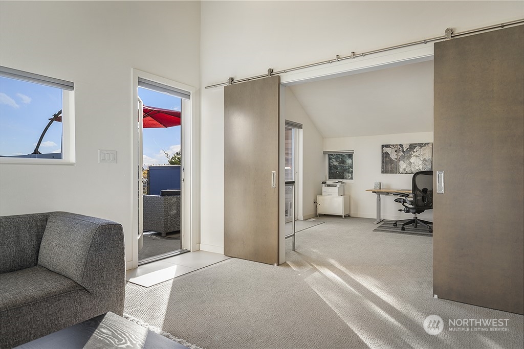 1406 South Bennett Street Seattle, WA 98108 - Photo 25 of 36 a bedroom with a bed and furniture