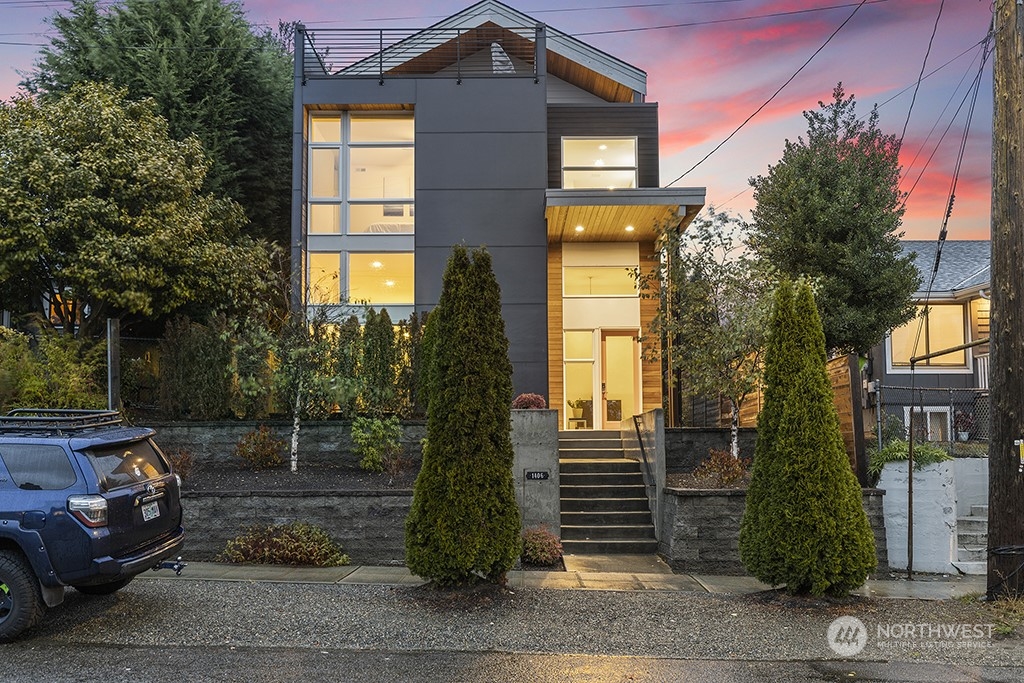 1406 South Bennett Street Seattle, WA 98108 - Photo 34 of 36 a front view of a house with a garden