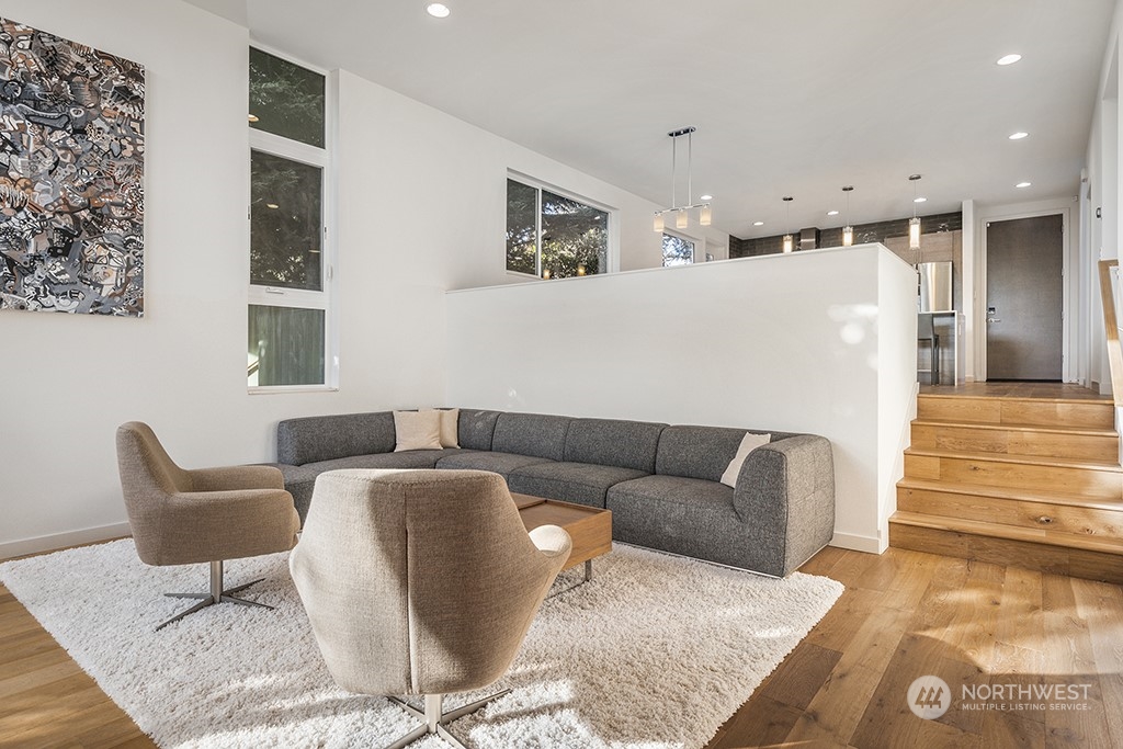 1406 South Bennett Street Seattle, WA 98108 - Photo 7 of 36 a living room with furniture and a rug