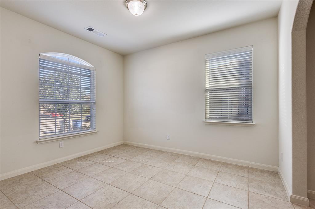 1707 Hot Springs Way Princeton, TX 75407 - Photo 3 of 12 a view of an empty room with a window