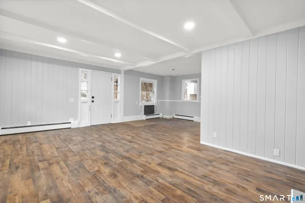 a kitchen with stainless steel appliances granite countertop a stove and a refrigerator