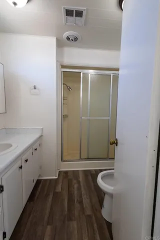 a bathroom with a sink and mirror