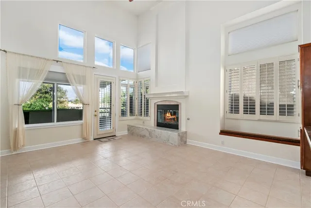 a view of an empty room with glass door