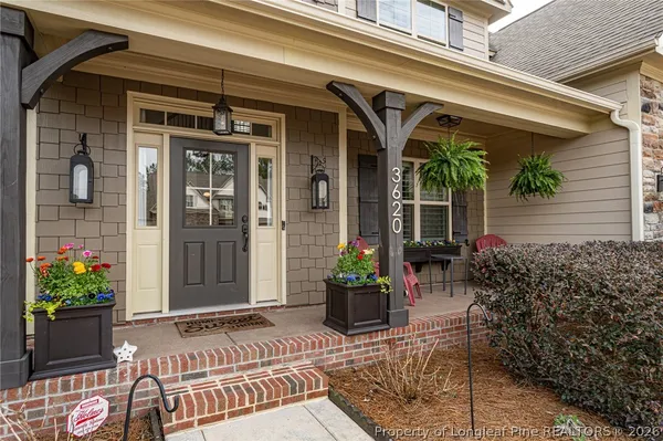 a view of house with patio