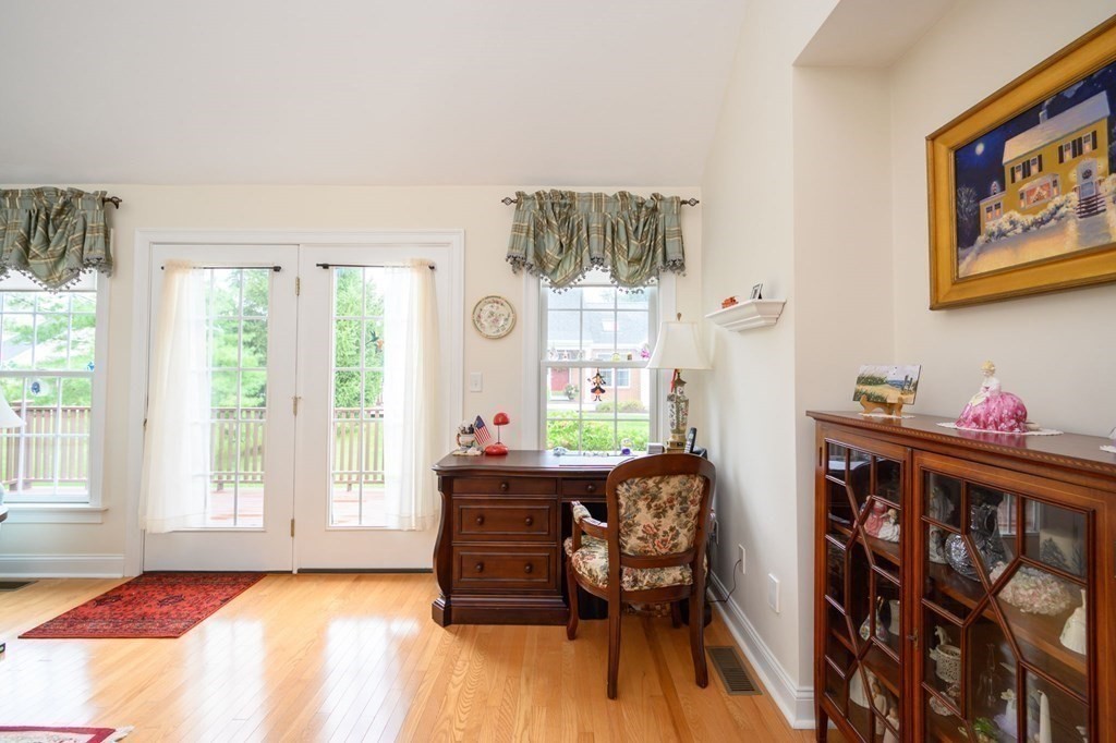 25 Hemlock Circle, Unit 25 Hanover, MA 02339 - Photo 18 of 36 a bedroom with furniture and a window