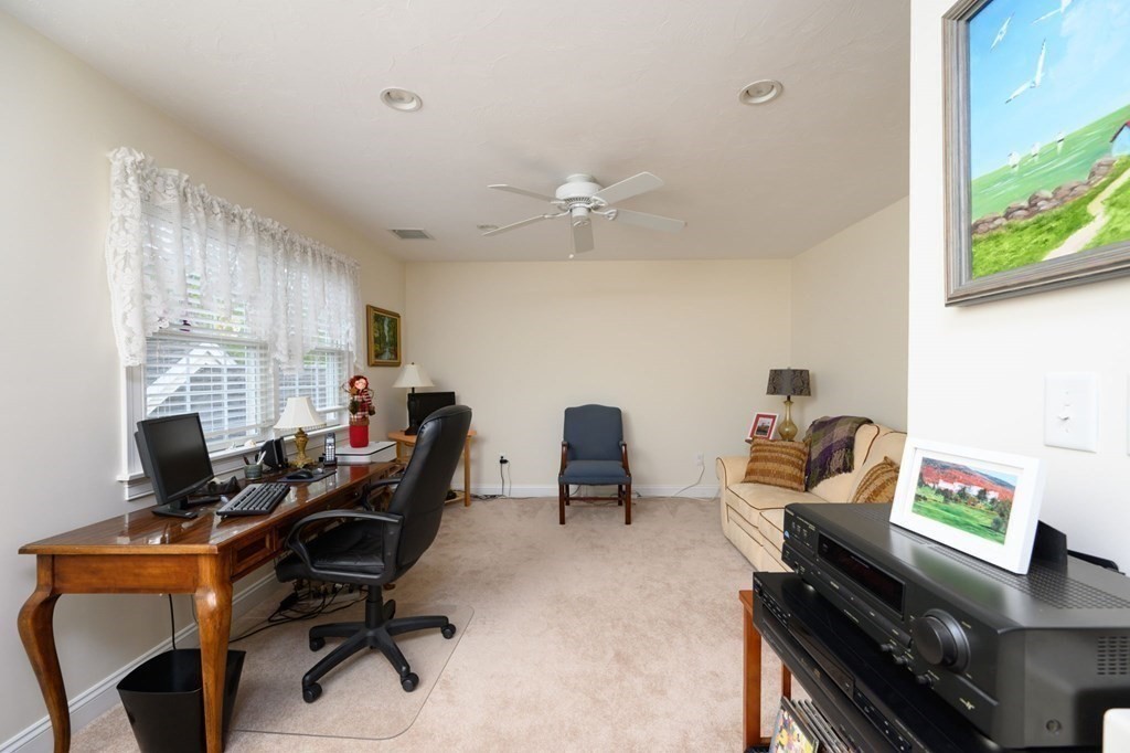 25 Hemlock Circle, Unit 25 Hanover, MA 02339 - Photo 29 of 36 a workspace with furniture and a window