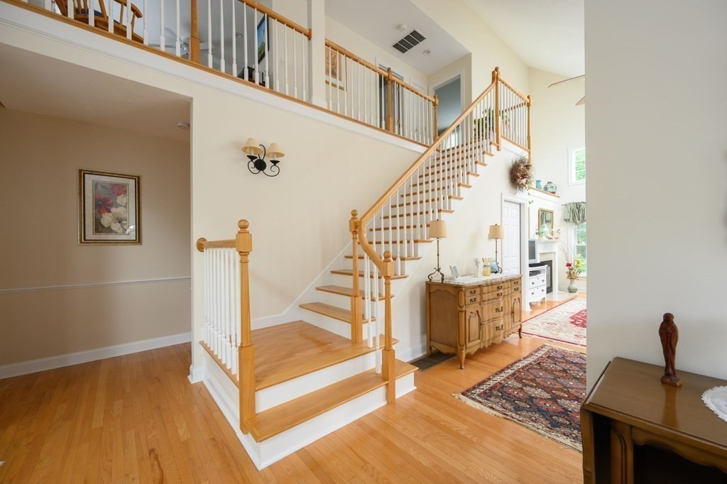 25 Hemlock Circle, Unit 25 Hanover, MA 02339 - Photo 8 of 36 a view of entryway and hall with wooden floor