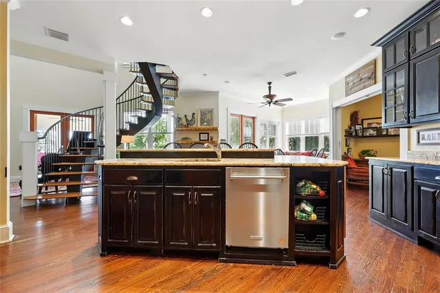 a bathroom with a toilet a sink and a mirror